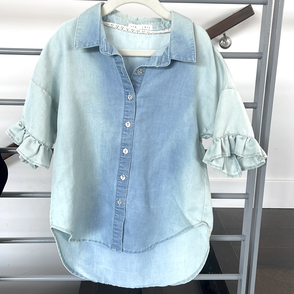New w/o Tags. Washed Denim Ruffle sleeve Button Up Shirt